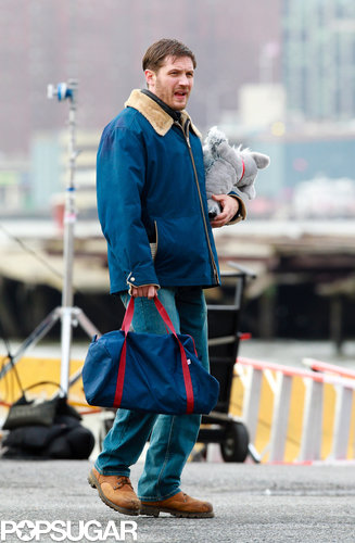 Tom Hardy Cuddles Up to a Canine Costar on Set Tom Hardy Cuddles Up to a Canine Costar on Set