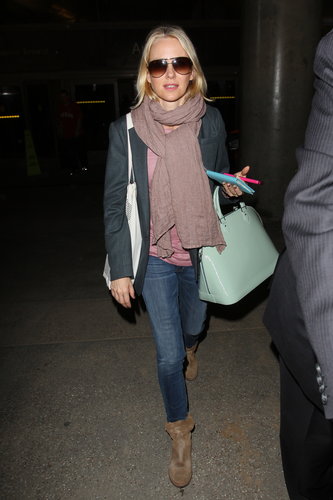 Add a pop of green (mint or otherwise) to your St. Paddy's Day look via a fashionable bag. We love the Louis Vuitton satchel Naomi Watts carried while traveling through LAX.
Add a pop of green (mint or otherwise) to your St. Paddy's Day look via a fashionable bag. We love the Louis Vuitton satchel Naomi Watts carried while traveling through LAX.