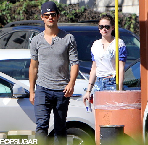 Kristen Stewart and Taylor Lautner hung out at the batting cages with friends.
Kristen Stewart and Taylor Lautner hung out at the batting cages with friends.