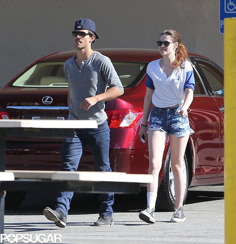Kristen Stewart and Taylor Lautner hung out at the batting cages with friends.
Kristen Stewart and Taylor Lautner hung out at the batting cages with friends.