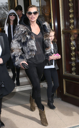 During Paris Fashion Week, Kate kept her outerwear and eyewear interesting in a fur coat and printed sunglasses.
During Paris Fashion Week, Kate kept her outerwear and eyewear interesting in a fur coat and printed sunglasses.
