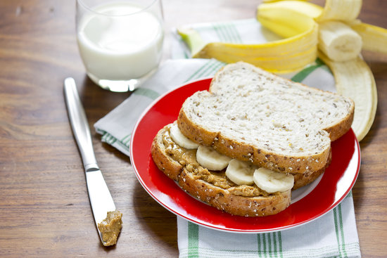 If they like: Peanut butter and jelly sandwiches
Try: Almond butter, drizzled with honey, and sliced banana
Whether it's for a morning or afternoon snack, PB & J sandwiches are the ultimate go-to snack. Make them even more appealing health-wise by substituting almond butter for peanut butter and swapping sugary jelly for honey and sliced bananas — you'll lose no time in the process.
If they like: Peanut butter and jelly sandwiches
Try: Almond butter, drizzled with honey, and sliced banana
Whether it's for a morning or afternoon snack, PB & J sandwiches are the ultimate go-to snack. Make them even more appealing health-wise by substituting almond butter for peanut butter and swapping sugary jelly for honey and sliced bananas — you'll lose no time in the process.