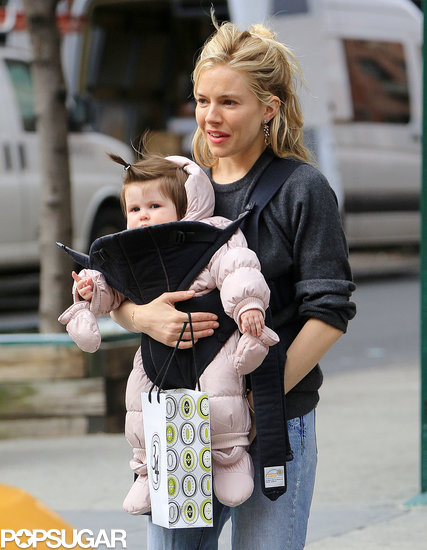 Sienna Miller carried Marlowe Sturridge while out shopping. Sienna Miller carried Marlowe Sturridge while out shopping.