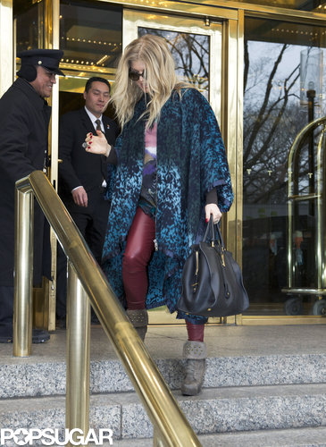 Fergie wore a leopard cape.
Fergie wore a leopard cape.