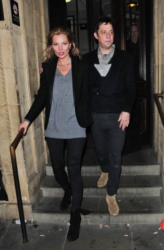 Kate Moss exited London's Royal Albert Hall in a cozy gray V-neck sweater, her signature black skinny jeans, a black blazer, and black suede boots.
Kate Moss exited London's Royal Albert Hall in a cozy gray V-neck sweater, her signature black skinny jeans, a black blazer, and black suede boots.