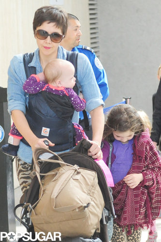 Maggie Gyllenhaal Lands in LA With Her Daughters and a New Pixie Cut Maggie Gyllenhaal Lands in LA With Her Daughters and a New Pixie Cut