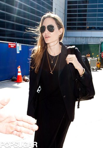 Angelina Denies Wedding Ring Rumors Upon Returning to LA Angelina Denies Wedding Ring Rumors Upon Returning to LA