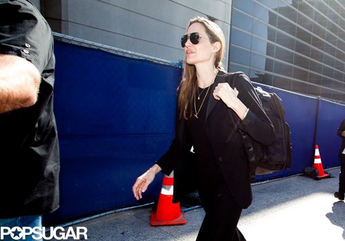 Angelina Denies Wedding Ring Rumors Upon Returning to LA Angelina Denies Wedding Ring Rumors Upon Returning to LA