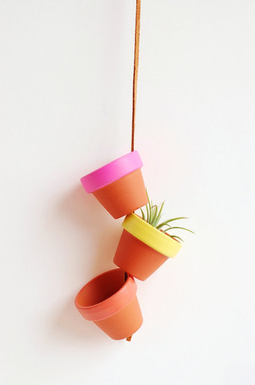 Three mini terracota planters ($18) look cheery and fun when strung together on a leather cord — perfect for air plants, ferns, or a little hanging herb garden.
Three mini terracota planters ($18) look cheery and fun when strung together on a leather cord — perfect for air plants, ferns, or a little hanging herb garden.