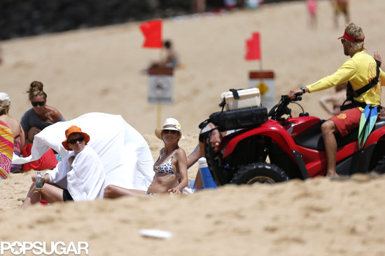 Heidi Klum shared a smile with a lifeguard while in Hawaii.
Heidi Klum shared a smile with a lifeguard while in Hawaii.