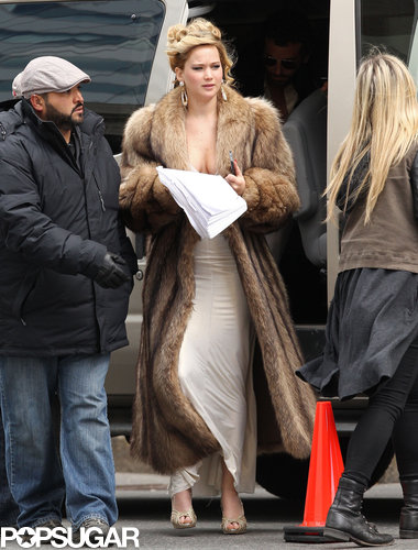 Jennifer Lawrence hid her cleavage under a fur jacket on set in Boston.
Jennifer Lawrence hid her cleavage under a fur jacket on set in Boston.