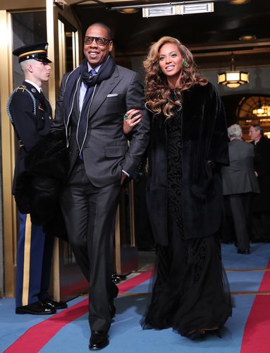 At President Obama's swearing-in ceremony in Washington DC, Beyoncé and Jay-Z brought two sophisticated ensembles. Beyoncé chose a black Emilio Pucci gown while Jay-Z wore a dark gray suit with a navy scarf.
At President Obama's swearing-in ceremony in Washington DC, Beyoncé and Jay-Z brought two sophisticated ensembles. Beyoncé chose a black Emilio Pucci gown while Jay-Z wore a dark gray suit with a navy scarf.