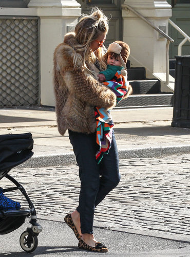 During a chilly day out with her daughter, Marlowe, in NYC, Sienna Miller bundled up in a fur coat, cropped pants, and her leopard loafers.
During a chilly day out with her daughter, Marlowe, in NYC, Sienna Miller bundled up in a fur coat, cropped pants, and her leopard loafers.