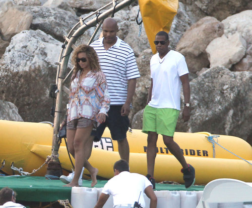 In September 2012, the couple wore their vacation gear while boarding a boat in the South of France. Beyoncé paired a printed blouse with shorts and Jay sported a white tee with neon green shorts.
In September 2012, the couple wore their vacation gear while boarding a boat in the South of France. Beyoncé paired a printed blouse with shorts and Jay sported a white tee with neon green shorts.