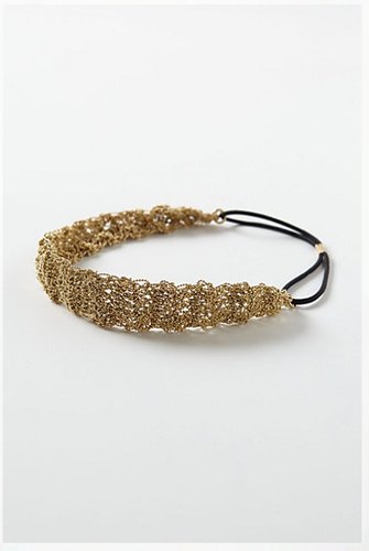 Anthropologie's metallic Tobiko headband ($38) would look gorgeous with a more casual wedding dress.
Anthropologie's metallic Tobiko headband ($38) would look gorgeous with a more casual wedding dress.