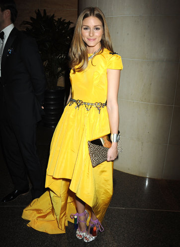 Olivia stepped out for the New Yorkers for Children 10th anniversary Spring dinner dance in NYC in a bold-hued Katie Ermilio gown, which she played up with sparkling add-ons, like her jeweled belt, necklace and lace-up heels.
Olivia stepped out for the New Yorkers for Children 10th anniversary Spring dinner dance in NYC in a bold-hued Katie Ermilio gown, which she played up with sparkling add-ons, like her jeweled belt, necklace and lace-up heels.