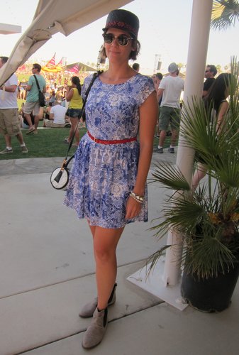 A sweet printed dress is accessorized with a bright red belt and feathered cap.
Source: Chi Diem Chau
A sweet printed dress is accessorized with a bright red belt and feathered cap.
Source: Chi Diem Chau