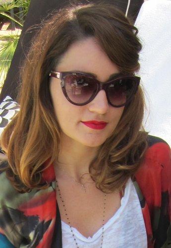 A pop of red across the lips was the cornerstone to this modern-vintage look.
Photo: Meg Cuna
A pop of red across the lips was the cornerstone to this modern-vintage look.
Photo: Meg Cuna