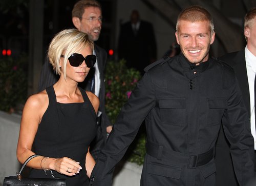 David Beckham had a smile on his face as he and Victoria arrived in LA in July 2007.
David Beckham had a smile on his face as he and Victoria arrived in LA in July 2007.