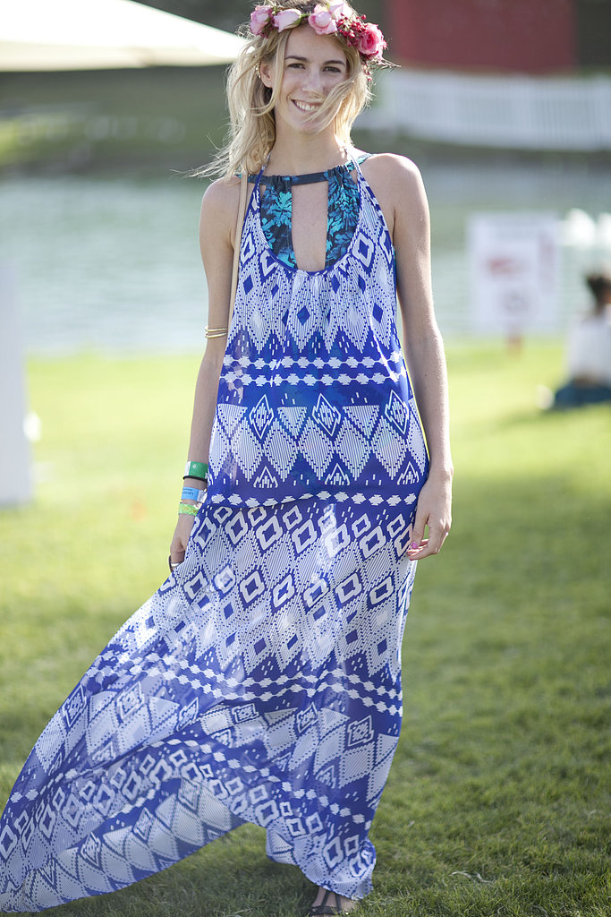 We couldn't close out the weekend without showing you one floral headpiece. This festival goer got it right with her rose headband and flowy tribal print maxidress.
We couldn't close out the weekend without showing you one floral headpiece. This festival goer got it right with her rose headband and flowy tribal print maxidress.