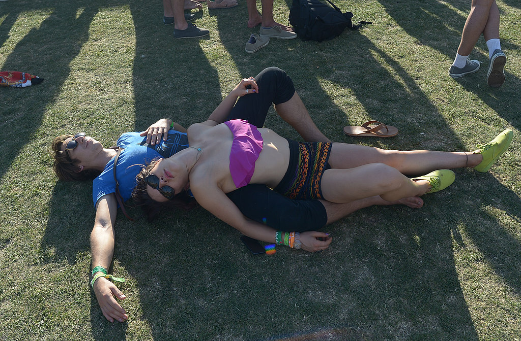 This Coachella pair relaxed together on the grass.
This Coachella pair relaxed together on the grass.