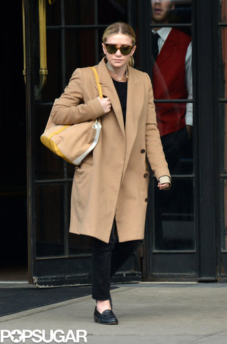Ashley Olsen wore a long beige coat to a meeting in NYC on Monday.
Ashley Olsen wore a long beige coat to a meeting in NYC on Monday.