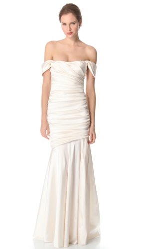 We love how the sleeves on this Theia off-the-shoulder gown ($995) fall ever-so effortlessly. Subtly sexy.
We love how the sleeves on this Theia off-the-shoulder gown ($995) fall ever-so effortlessly. Subtly sexy.
