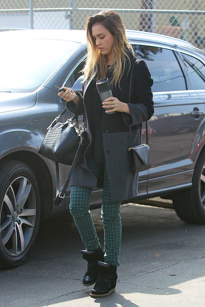 Jessica continued her reign as the print-jean queen, styling a pair of Big Star houndstooth denim with a colorblock coat and cutout leather duffel, both by Gérard Darel, and Isabel Marant sneakers in LA.
Jessica continued her reign as the print-jean queen, styling a pair of Big Star houndstooth denim with a colorblock coat and cutout leather duffel, both by Gérard Darel, and Isabel Marant sneakers in LA.