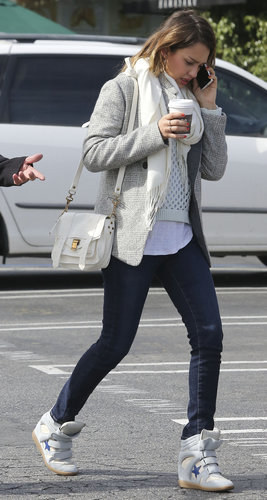 Jessica accessorized her neutral LA ensemble, including dark skinnies, with Isabel Marant sneakers and a mini Proenza Schouler bag.
Jessica accessorized her neutral LA ensemble, including dark skinnies, with Isabel Marant sneakers and a mini Proenza Schouler bag.