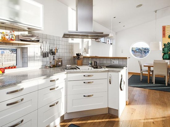 Clean lines and metallic accents give the kitchen a polished look.
Source: Sotheby's
Clean lines and metallic accents give the kitchen a polished look.
Source: Sotheby's