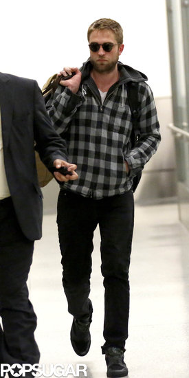 Robert Pattinson walked through LAX. Robert Pattinson walked through LAX.
