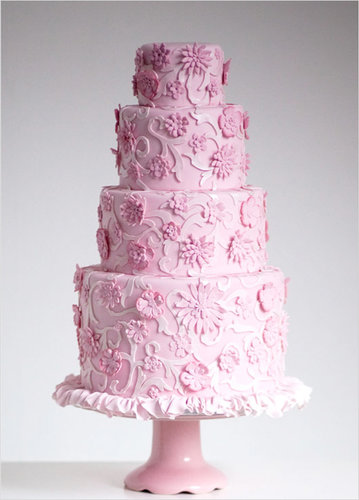 This cake, full of flowers, frills, and delicate details, has all the makings of a traditional cake — except it's all pink and was modeled after a Chanel dress.
Photo by Sugar Ruffles via Wedding Chicks
This cake, full of flowers, frills, and delicate details, has all the makings of a traditional cake — except it's all pink and was modeled after a Chanel dress.
Photo by Sugar Ruffles via Wedding Chicks
