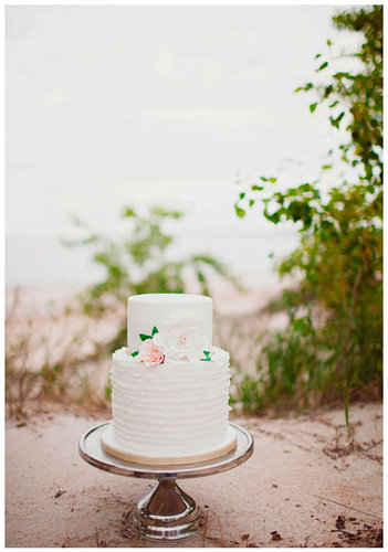 This two-layered ruffle and floral cake is effortless and elegant all at once; consider it a great option for beach weddings and beyond.
Photo by Sarah Layne Photography via 100 Layer Cake
This two-layered ruffle and floral cake is effortless and elegant all at once; consider it a great option for beach weddings and beyond.
Photo by Sarah Layne Photography via 100 Layer Cake