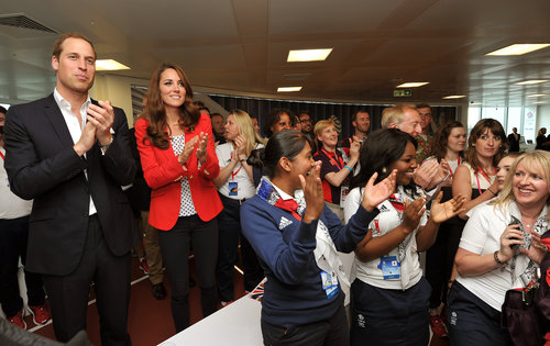 For day seven at the London Olympics, the couple visited the Team Great Britain house in apropos UK colors.
For day seven at the London Olympics, the couple visited the Team Great Britain house in apropos UK colors.