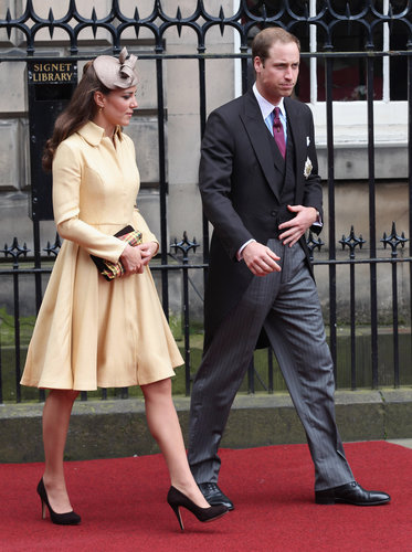 The Duchess of Cambridge wore a custom pale yellow Emilia Wickstead coat to see Prince William be inducted into the Order of the Thistle in July 2012.
The Duchess of Cambridge wore a custom pale yellow Emilia Wickstead coat to see Prince William be inducted into the Order of the Thistle in July 2012.
