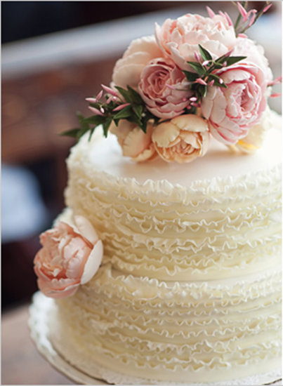 There's something so sweet about this simple but beautiful cake — the ruffles and flowers make the perfect classic combo.
Photo by Oh, Darling! via Wedding Chicks
There's something so sweet about this simple but beautiful cake — the ruffles and flowers make the perfect classic combo.
Photo by Oh, Darling! via Wedding Chicks