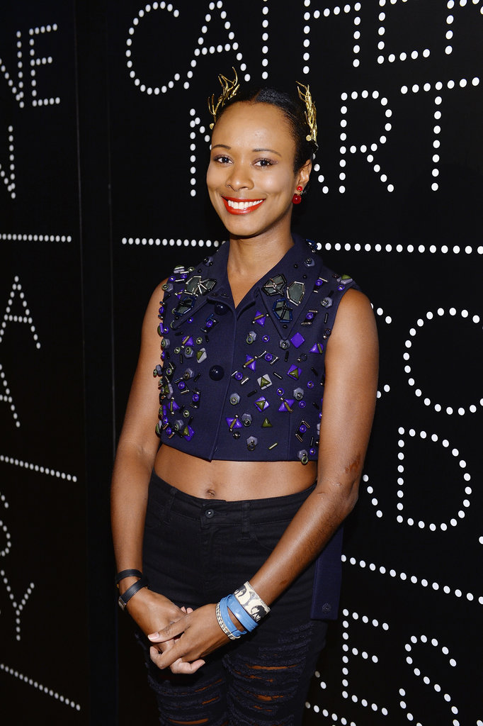 Shala Monroque showed off the season's belly-baring trend in an embellished sleeveless top paired with ripped jeans, a quirky gold headpiece, and stacked bracelets at the Prada and The Great Gatsby cocktail party.
Shala Monroque showed off the season's belly-baring trend in an embellished sleeveless top paired with ripped jeans, a quirky gold headpiece, and stacked bracelets at the Prada and The Great Gatsby cocktail party.