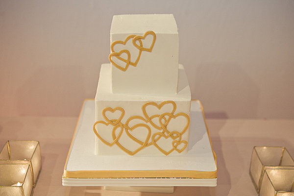 At its core, this cake is pretty simple (two square tiers), but we love how this no-fuss heart design adds some instant pizzazz.
Photo by Megan Hartley Photography via Wedding Chicks
At its core, this cake is pretty simple (two square tiers), but we love how this no-fuss heart design adds some instant pizzazz.
Photo by Megan Hartley Photography via Wedding Chicks