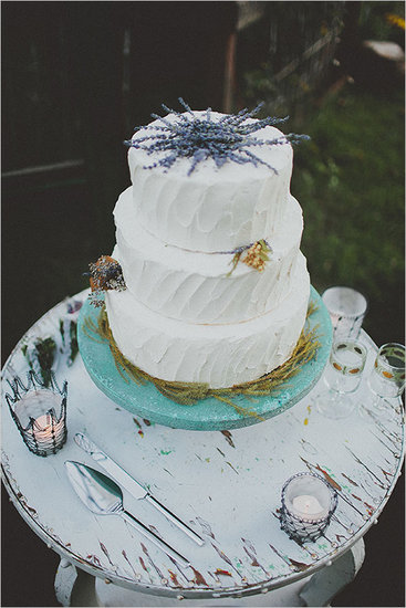 With lavender peeking out from the top, this charming white cake has all the potential to steal the show.
Photo by Blue Vinyl Creative via Wedding Chicks
With lavender peeking out from the top, this charming white cake has all the potential to steal the show.
Photo by Blue Vinyl Creative via Wedding Chicks