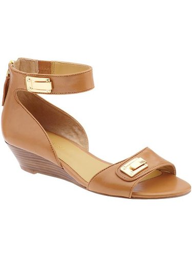 Nine West's Violin Sandals ($89) are sleek and Summer-ready and have a sturdy wooden wedge for wearing with cropped pants and dresses alike.
Nine West's Violin Sandals ($89) are sleek and Summer-ready and have a sturdy wooden wedge for wearing with cropped pants and dresses alike.