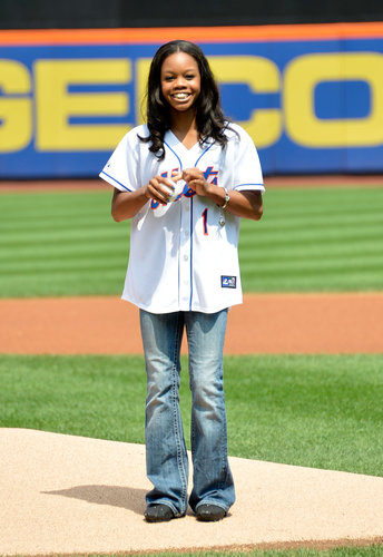 Olympic gold medalist Gabby Douglas threw the first pitch for the Mets game in NYC in August 2012.
Olympic gold medalist Gabby Douglas threw the first pitch for the Mets game in NYC in August 2012.