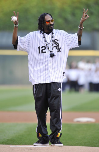 Snoop Lion threw up a peace sign before the first pitch at the Chicago White Sox game in May 2012.
Snoop Lion threw up a peace sign before the first pitch at the Chicago White Sox game in May 2012.