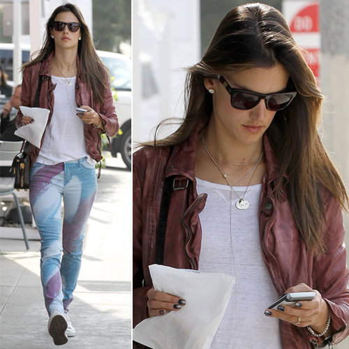 Alessanda Ambrosio styled printed denim with a leather topper and Westward Leaning shades in LA's Brentwood neighborhood.
Alessanda Ambrosio styled printed denim with a leather topper and Westward Leaning shades in LA's Brentwood neighborhood.