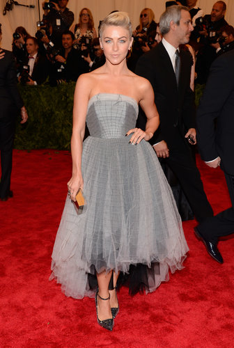Julianne Hough tapped into her dark side in a strapless Topshop high-low dress and studded ankle-strap pumps.
Julianne Hough tapped into her dark side in a strapless Topshop high-low dress and studded ankle-strap pumps.