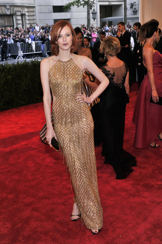 Karen Elson shimmered in a gold beaded and fringed Julien Macdonald halter gown.
Karen Elson shimmered in a gold beaded and fringed Julien Macdonald halter gown.