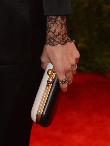 Jaime King carried a black-and-white Alexander McQueen clutch.
Jaime King carried a black-and-white Alexander McQueen clutch.