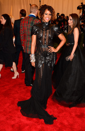 Eve looked tough in heavy eyeliner and a sheer black dress with woven leather strips.
Eve looked tough in heavy eyeliner and a sheer black dress with woven leather strips.