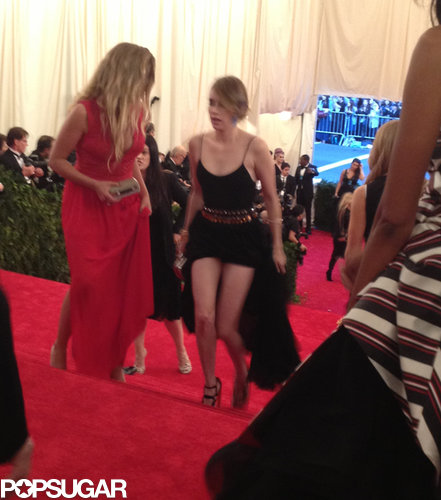 Emma Roberts hiked up her dress to prevent a Met Gala stairs disaster.
Emma Roberts hiked up her dress to prevent a Met Gala stairs disaster.