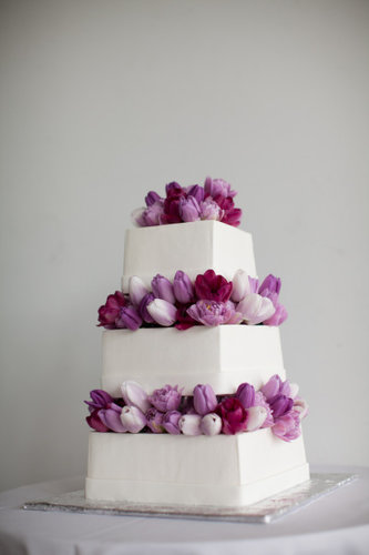 By arranging different shades of tulips to create a starburst effect, this cake reinvents the notion of flower-filled cake.
Photo by The Popes via By arranging different shades of tulips to create a starburst effect, this cake reinvents the notion of flower-filled cake.
Photo by The Popes via