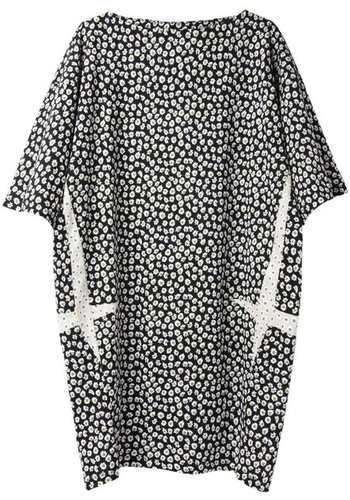 Stride into Summer in Kenzo's boatneck dress ($328). The diluted cocoon style makes for a comfortable fit, and the tiny blooms conjure up memories of every flowery frock you loved as a little girl.
Stride into Summer in Kenzo's boatneck dress ($328). The diluted cocoon style makes for a comfortable fit, and the tiny blooms conjure up memories of every flowery frock you loved as a little girl.